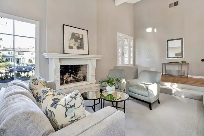 This is the living room of 2001 port cardiff in newport beach Port streets home: living room fireplace newport beach