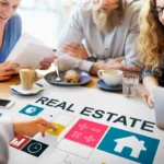A group of people sitting around a table talking about long beach real estate